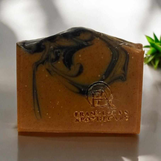 Charcoal & Turmeric Soap bar with natural detoxifying ingredients, ideal for oily skin and acne treatment.