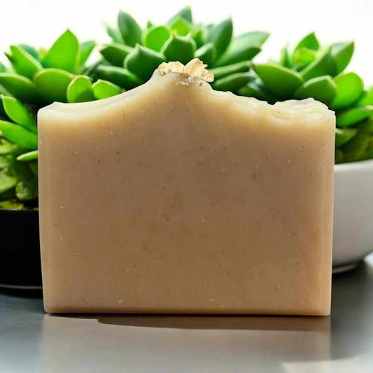 Large oatmeal and honey soap bar, fragrance-free, moisturizing and soothing for sensitive skin with natural ingredients.