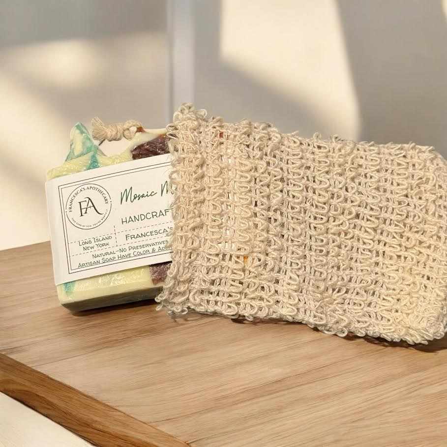 MOSAIC Mosaic Medley Soap with soap saver bag on wooden surface.
