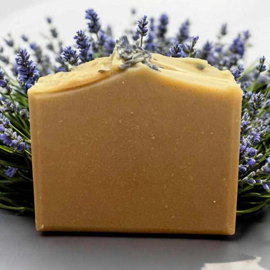 Large goat milk honey and lavender bentonite clay soap bar with lavender buds and natural ingredients