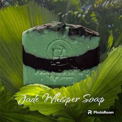 Jade Whisper Soap with eucalyptus, spearmint, and lemon in green and charcoal hues.