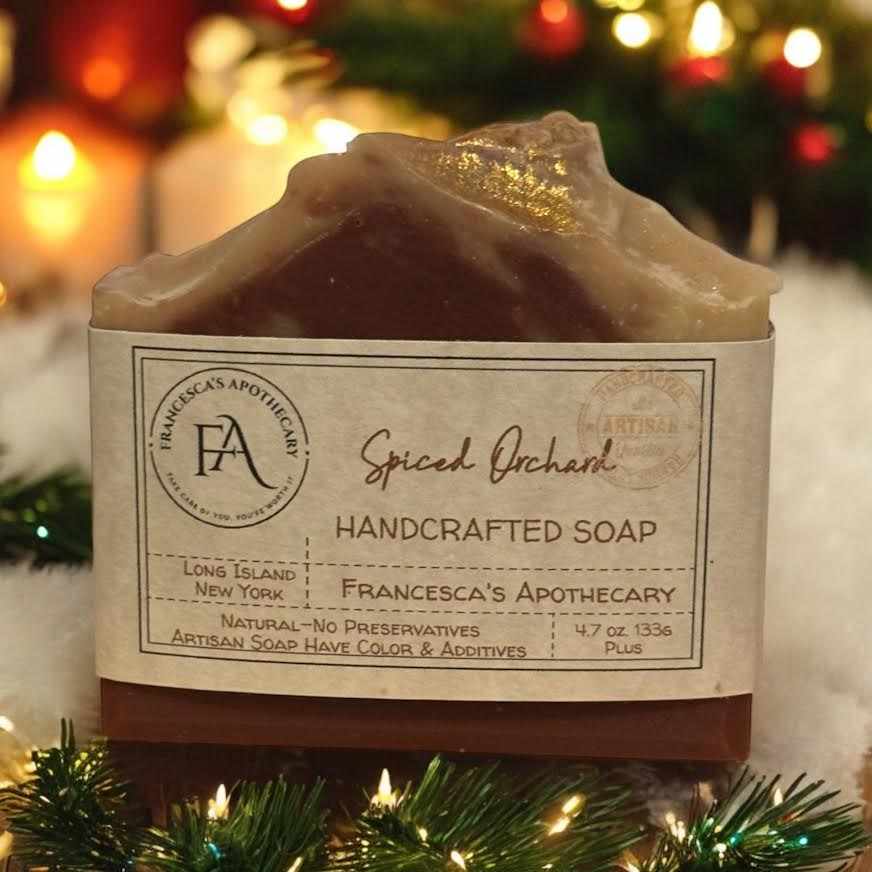 Spiced Orchard Soap with notes of cranberry, apple, orange, ginger, nutmeg, and cinnamon, made with organic oils and Moroccan clay.