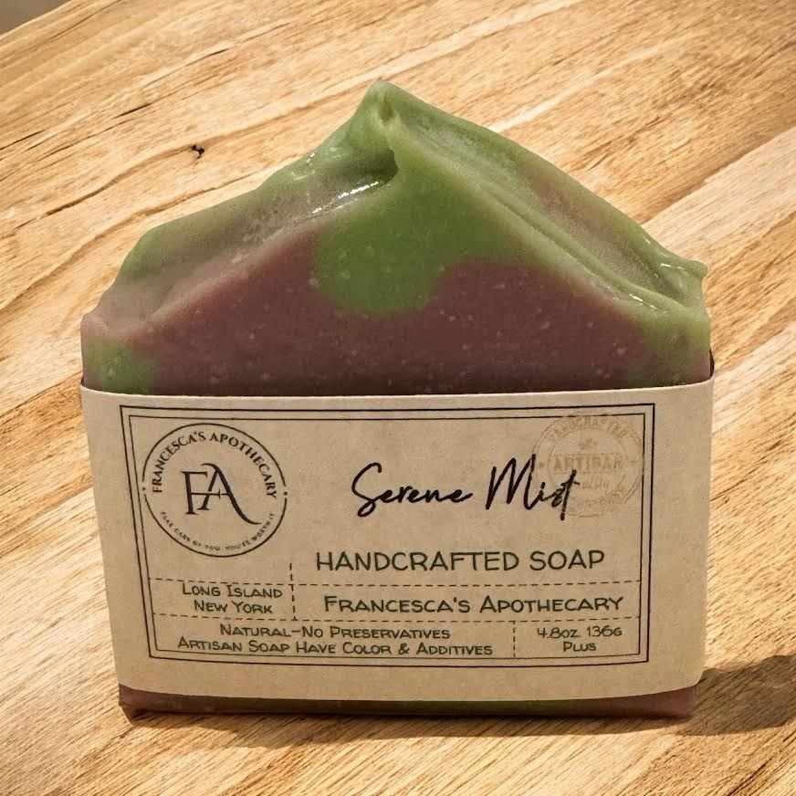 Serene Mist Soap with spa-inspired floral scent on wooden background.