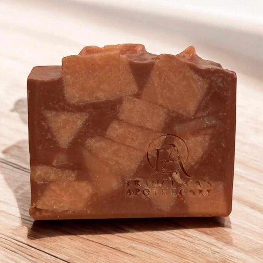 Sassy Marble Rose Soap with elegant marbled design on a wooden surface.