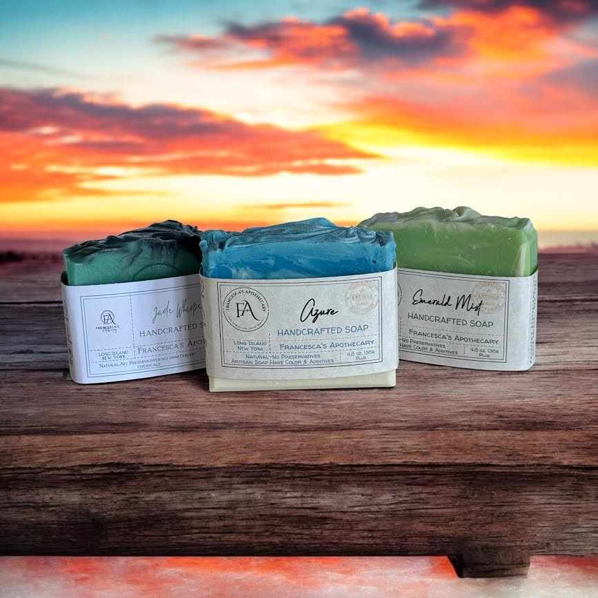 MENS SOAP BUNDLE featuring handcrafted Jade Whisper, Azure, and Emerald Mist soaps with a sunset backdrop.
