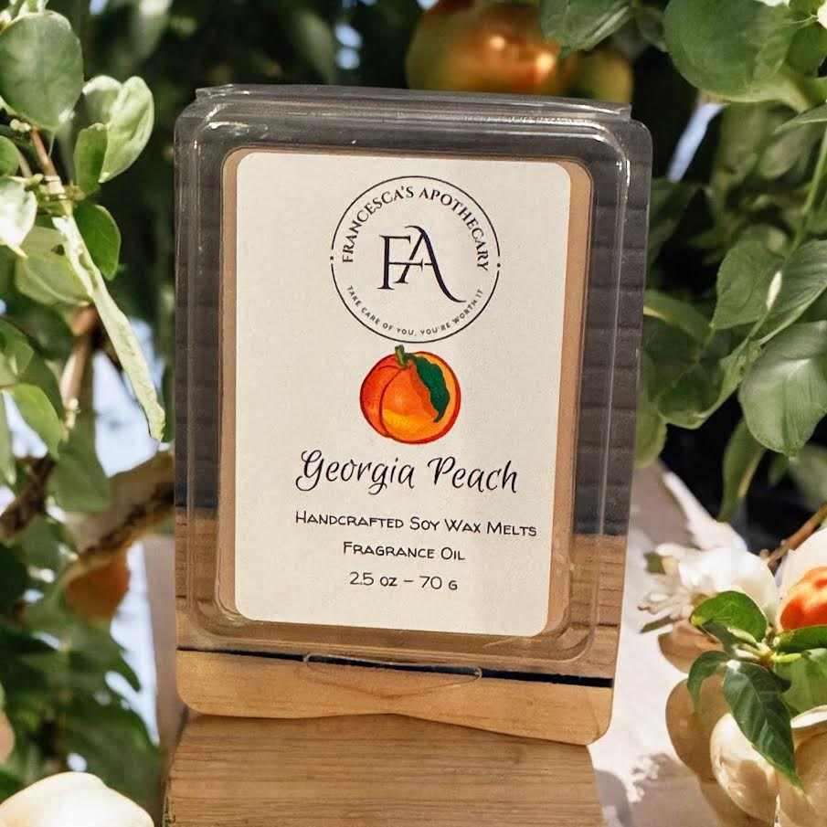 Georgia Peach Soy Wax Melt with sweet peach fragrance in nature setting.