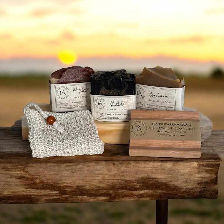 EARTHY WOODY AMBER luxury soap set in an elegant white box with logo, featuring Vanilla Sandalwood, Cedar & Amber, and Cozy Cashmere scents.