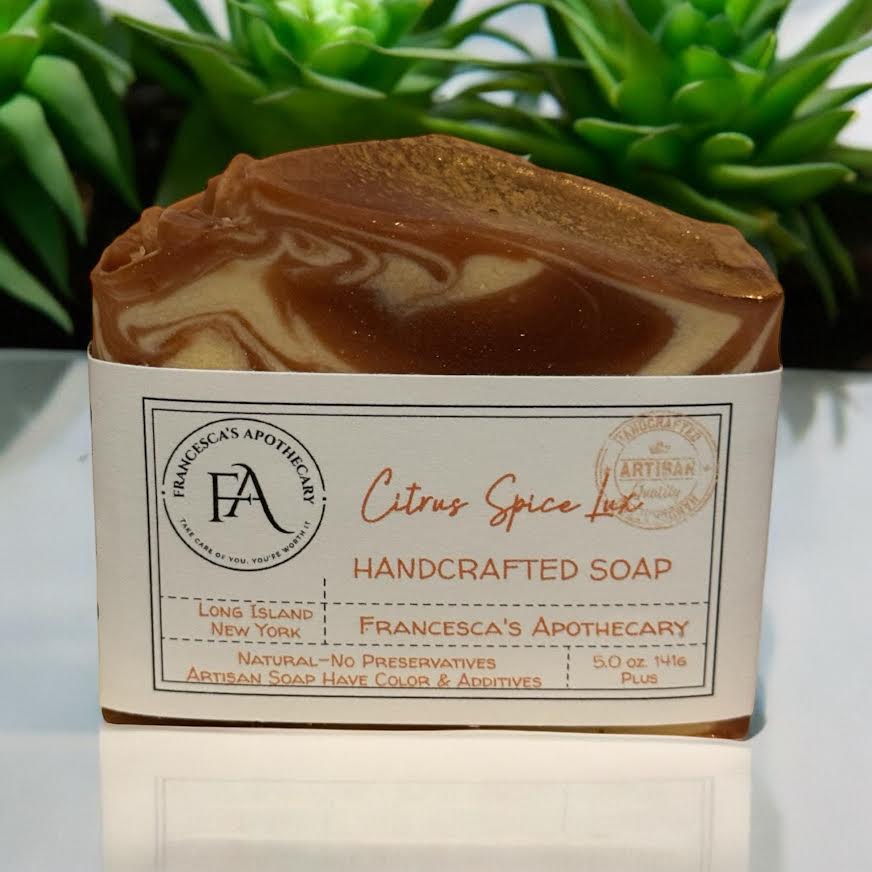 Luxurious spicy fruit soap in white box with citrus and spice aroma, perfect for gifting.