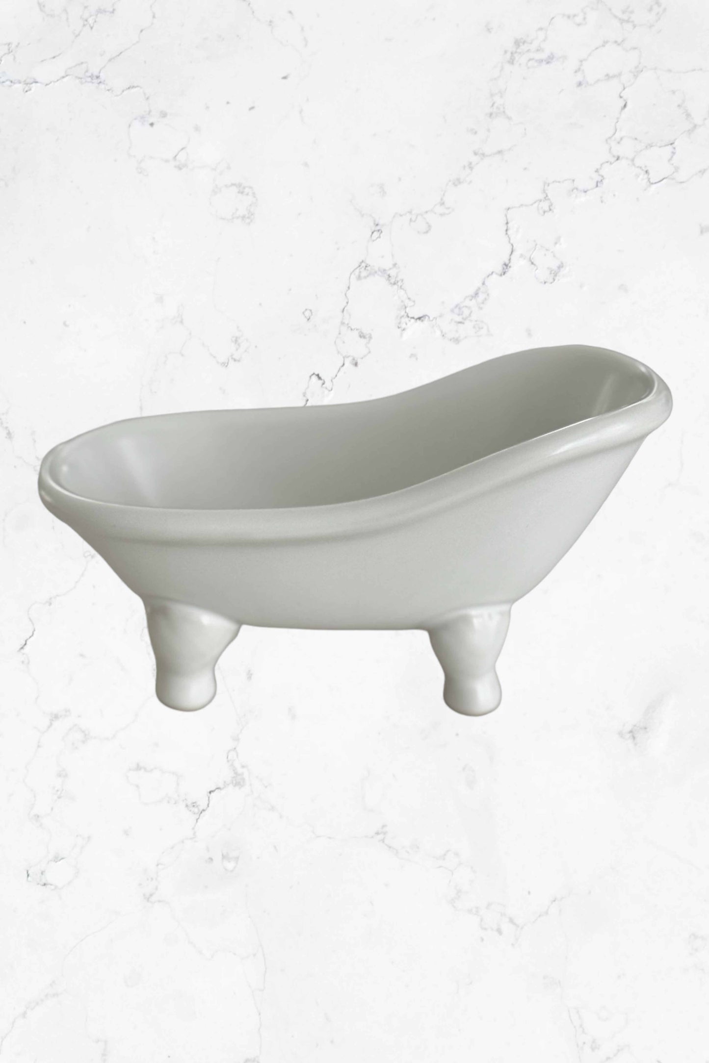 Ceramic Tub Soap Dish with drainage holes, elegant white design.